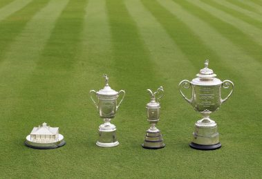 The four men's major championship trophies